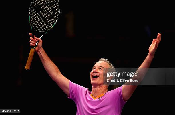 John McEnroe of USA celebrates a point during his group match against Wayne Ferreira of South Africa on day two of the Statoil Masters Tennis at the...