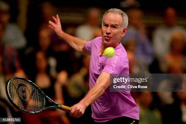 John McEnroe of USA in action during his group match against Wayne Ferreira of South Africa on day two of the Statoil Masters Tennis at the Royal...