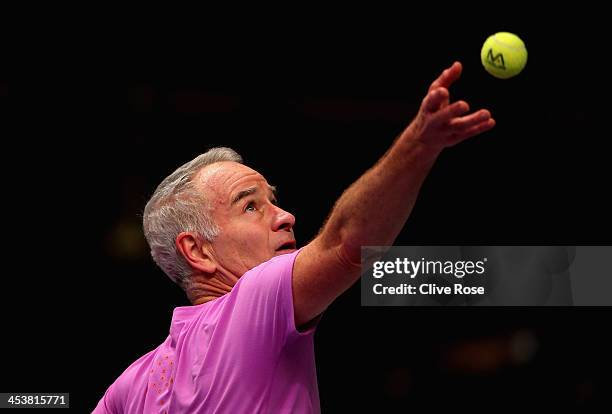 John McEnroe of USA in action during his group match against Wayne Ferreira of South Africa on day two of the Statoil Masters Tennis at the Royal...