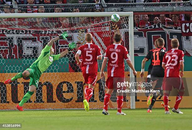 Rafael van der Vaart of Hamburg scores the third goal during the DFB Cup match between FC Energie Cottbus and Hamburger SV at Stadion der...