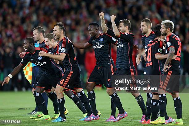 The players of Hamburg show their delight after winning the DFB Cup match between FC Energie Cottbus and Hamburger SV at Stadion der Freundschaft on...