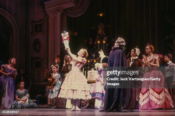 American dancer Mary Barton and New Zealander Alexander Grant perform during Act I of the Joffrey Ballet's production of 'The Nutcracker' at City...