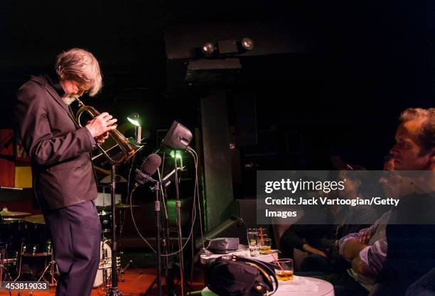 American Jazz musician Tom Harrell plays fluegelhorn as he leads his quintet during their second set at the Village Vanguard, New York, New York,...