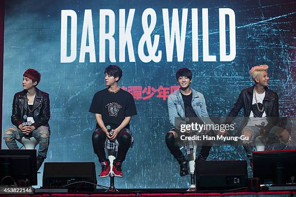 Jin, Jung Kook and Rap Monster of BTS attends the BTS 1st Album "Dark And Wild" Show Case" at the Samsung Card Hall on August 19, 2014 in Seoul,...