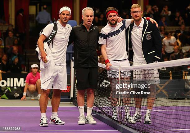 Jamie Redknapp, John McEnroe, Jack Whitehall and Andrew Flintoff pose at the net after a challenge match against John McEnroe whilst filming for 'A...