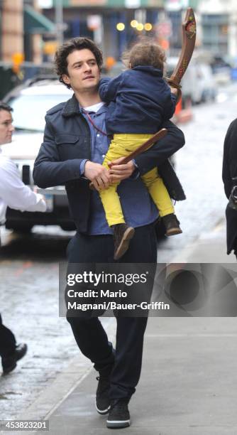 Orlando Bloom and his son Flynn Bloom are seen on December 5, 2013 in New York City.