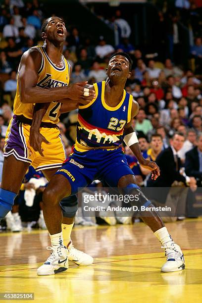 Dunn of the Denver Nuggets boxes out against the Los Angeles Lakers circa 1991 at the Great Western Forum in Inglewood, California. NOTE TO USER:...