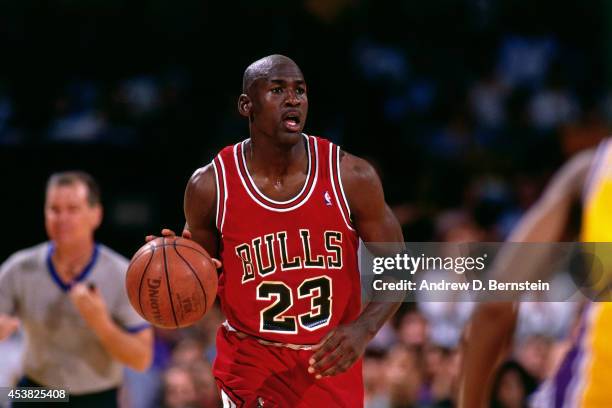 Michael Jordan of the Chicago Bulls dribbles during Game Three of the 1991 NBA Finals on June 7, 1991 at the Great Western Forum in Inglewood,...