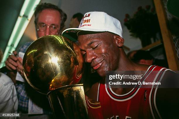 Michael Jordan of the Chicago Bulls celebrates following Game Five of the 1991 NBA Finals on June 12, 1991 at the Great Western Forum in Inglewood,...