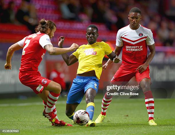 Simon Dawkins of Derby County is challenged by Joe Gomez of Charlton during the Sky Bet Championship match between Charlton Athletic and Derby County...