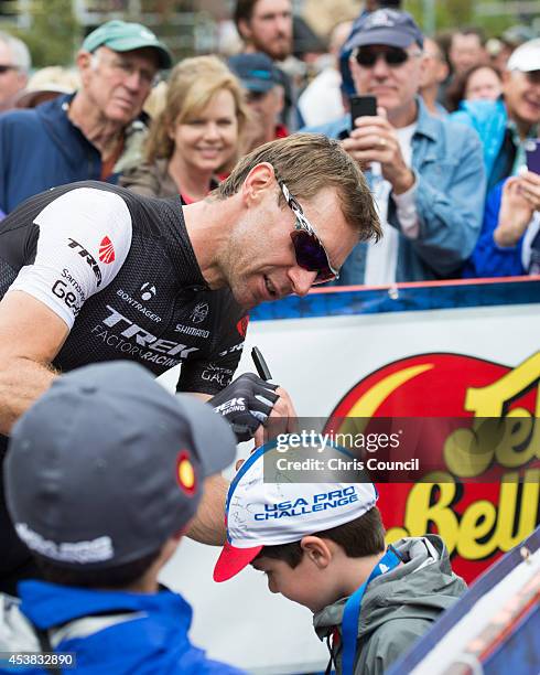 Jens Voigt of Germany riding for Trek Factory Racing signs autographs prior to the start of stage two of the 2014 USA Pro Challenge on August 19,...