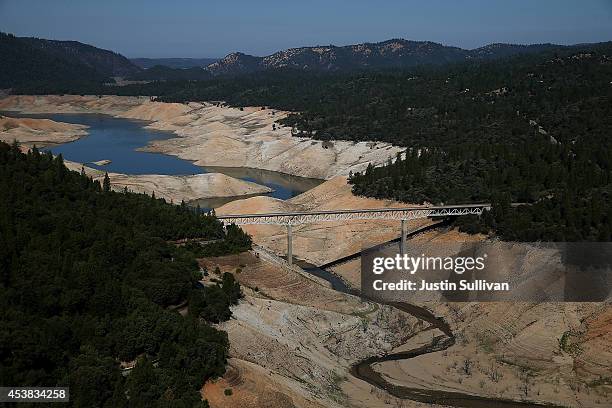 The Enterprise Bridge passes over a section of Lake Oroville that is nearly dry on August 19, 2014 in Oroville, California. As the severe drought in...