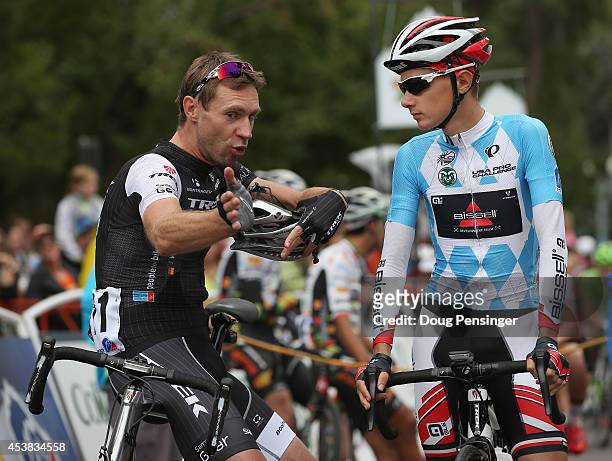 Jens Voigt of Germany riding for Trek Factory Racing and Clement Chevrier of France riding for the Bissell Development Team talk at the start of...