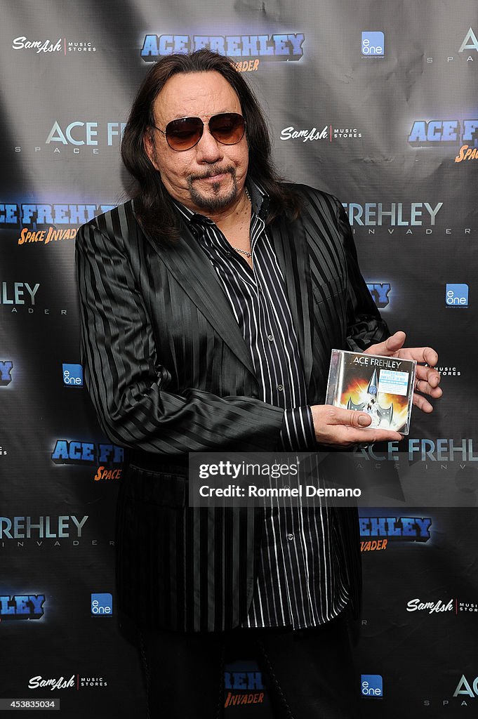 Ace Frehley Signs Copies Of "Space Invader"