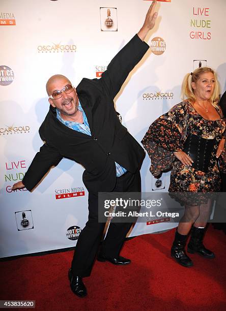 Adult film actors James Bartholet and Ginger Lynn arrive at the premiere of "Live Nude Girls" held at Avalon on August 12, 2014 in Hollywood,...