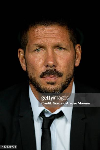 Head coach Diego Pablo Simeone of Atletico de Madrid looks on prior to start the Supercopa first leg match between Real Madrid and Club Atletico de...