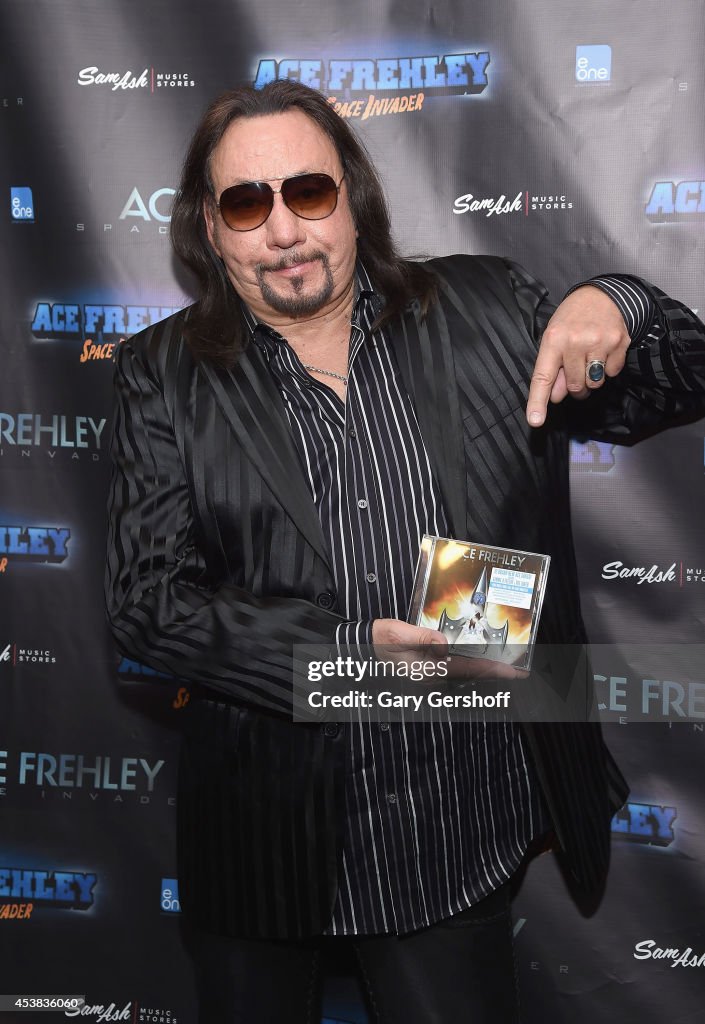 Ace Frehley Signs Copies Of "Space Invader"