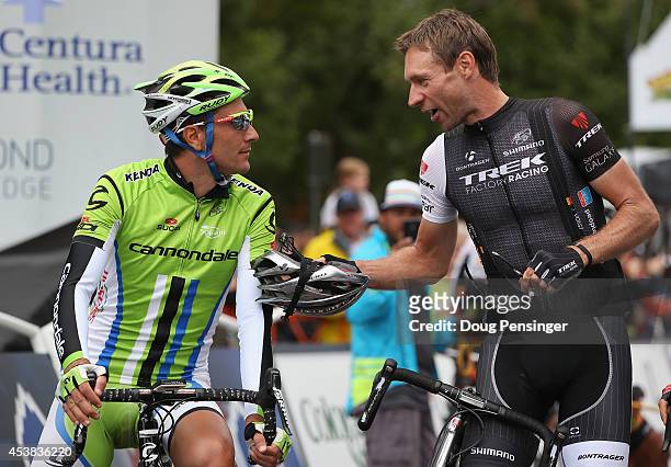 Ivan Basso of Italy riding for Cannondale and Jens Voigt of Germany riding for Trek Factory Racing prepare for the start of stage two of the 2014 USA...