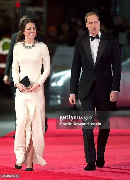 Catherine, Duchess of Cambridge, wearing a Roland Mouret dress, and Prince William, Duke of Cambridge attend the Royal film performance of 'Mandela:...