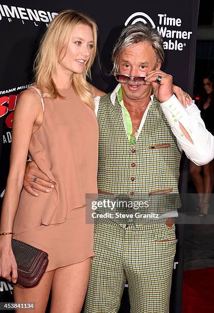 Model Anastassija Makarenko and actor Mickey Rourke attends the "Sin City: A Dame To Kill For" Los Angeles premiere at TCL Chinese Theatre on August...
