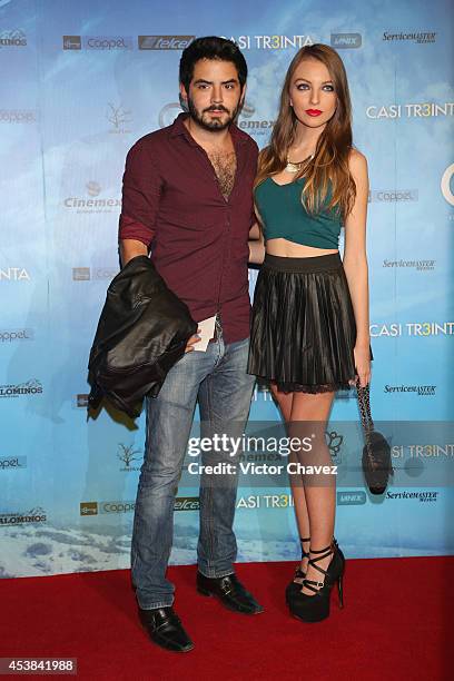 José Eduardo Derbez and guest attend "Casi Treinta" Mexico City premiere red carpet at Cinemex Antara Polanco on August 19, 2014 in Mexico City,...