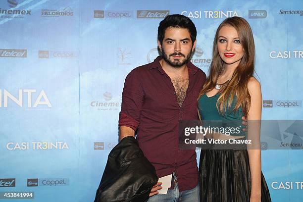 José Eduardo Derbez and guest attend "Casi Treinta" Mexico City premiere red carpet at Cinemex Antara Polanco on August 19, 2014 in Mexico City,...