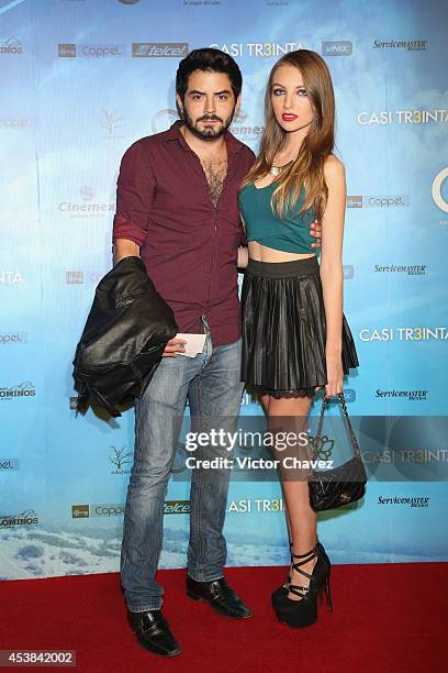 José Eduardo Derbez and guest attend "Casi Treinta" Mexico City premiere red carpet at Cinemex Antara Polanco on August 19, 2014 in Mexico City,...