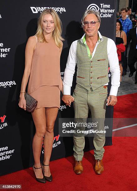 Actor Mickey Rourke and Anastassija Makarenko arrive at the Los Angeles premiere of "Sin City: A Dame To Kill For" at TCL Chinese Theatre on August...