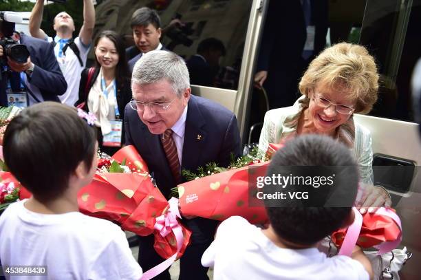 President Thomas Bach and his wife Claudia Bach visit the Nanjing Sport Institute on day three of the Nanjing 2014 Summer Youth Olympic Games on...