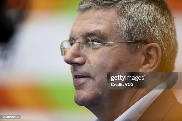 President Thomas Bach talks to the media on day three of the Nanjing 2014 Summer Youth Olympic Games on August 19, 2014 in Nanjing, China.