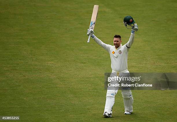 Michael Clarke of Australia celebrates after he scored his century during day two of the Second Ashes Test Match between Australia and England at...