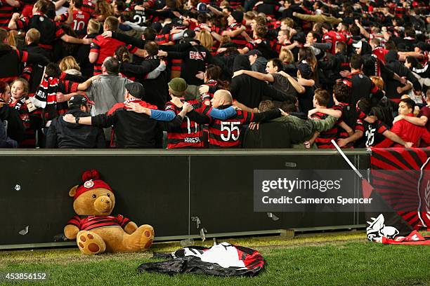 Wanderers fans chant with their backs turned away from the pitch during the Asian Champions League Final match between the Western Sydney Wanderers...