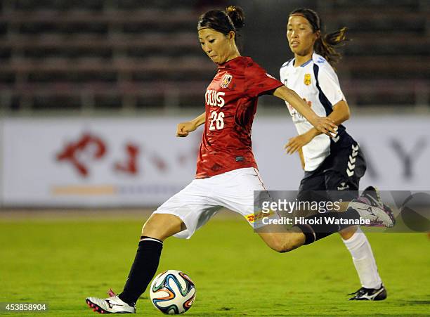 Ami Otaki of Urawa Reds Ladies shoots during the Nadeshiko League match between Urawa Red Diamonds Ladies and INAC Kobe Leonessa at Komaba Stadium on...