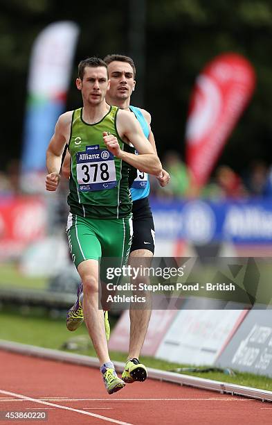 Michael McKillop of Ireland leads Chermen Kobesov of Russia in the Men's 800m T38 event during day two of the IPC Athletics European Championships at...