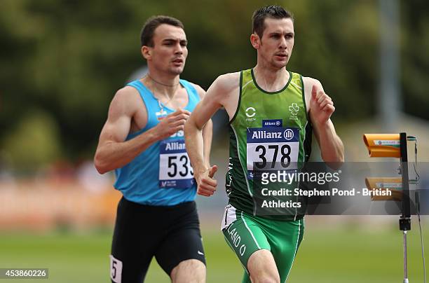 Michael McKillop of Ireland leads Chermen Kobesov of Russia in the Men's 800m T38 event during day two of the IPC Athletics European Championships at...
