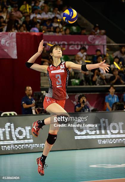 Saori Kimura of Japan serves the ball against Russia during the FIVB World Grand Prix Final - Group 1 on August 20, 2014 in Tokyo, Japan.
