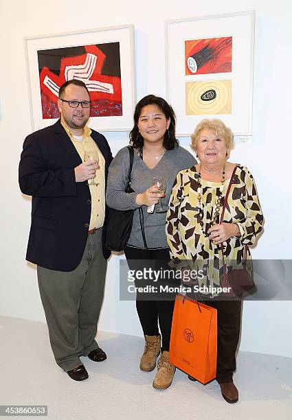 Douglas Welch, Helen Cho and Maria Perez attend "love art, give a smile" Art Fashion And Design Benefit at Clen Gallery on December 5, 2013 in New...