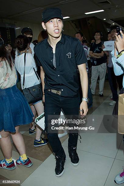 Dong Woo of South Korean boy band Infinite is seen upon arrival at Gimpo Airport on August 20, 2014 in Seoul, South Korea.