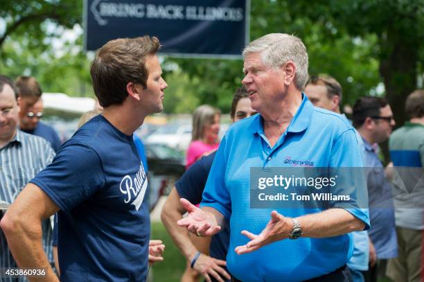 Rep. Aaron Schock, R-Ill., left, talks with Jim Oberweis, Republican senate candidate for Illinois, during Republican Day at the Illinois State Fair...