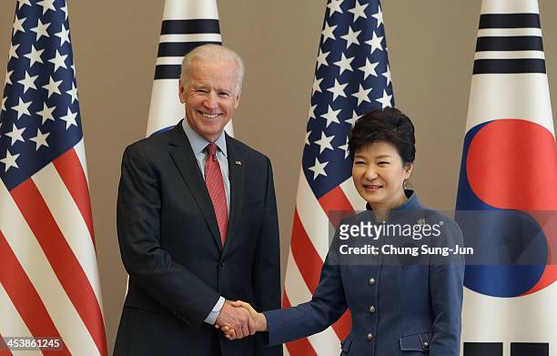 Vice President Joe Biden shakes hands with South Korean President Park Geun-Hye during their meeting at presidentisl house on December 6, 2013 in...