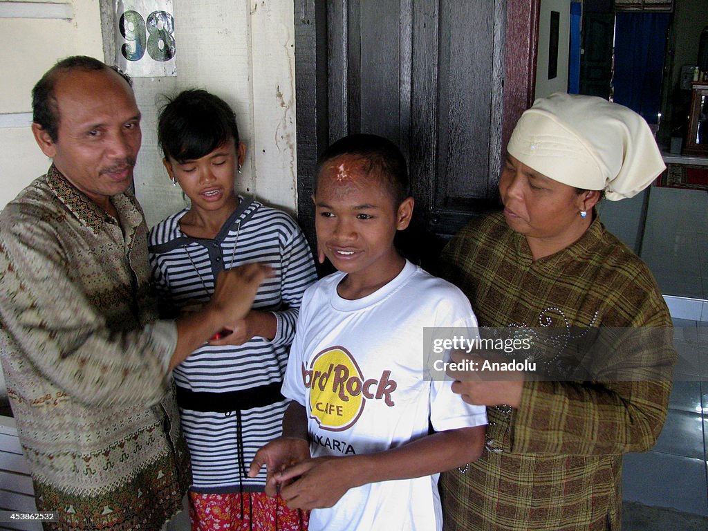 Victim of Indonesia tsunami reunited with his family