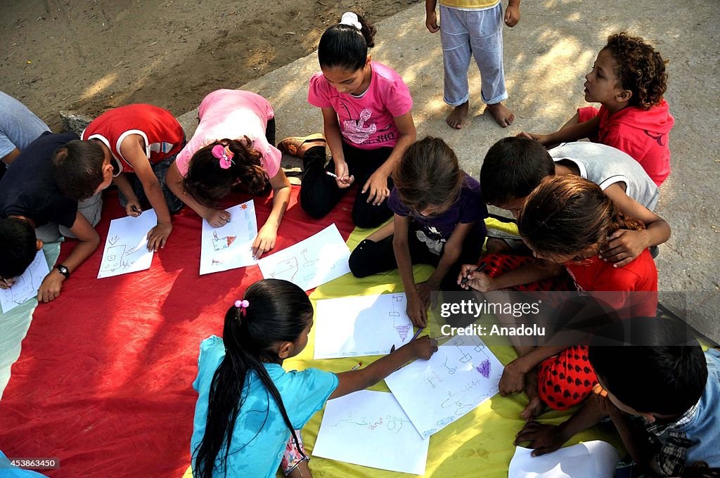 Palestinian children are rehabilitated with playing games at a school of UNRWA in Gaza