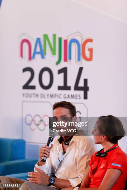 Olympic swimming champion Chad Le Clos and Olympic triathlon champion Emma Snowsill attend "chat with champions" event on day four of the Nanjing...