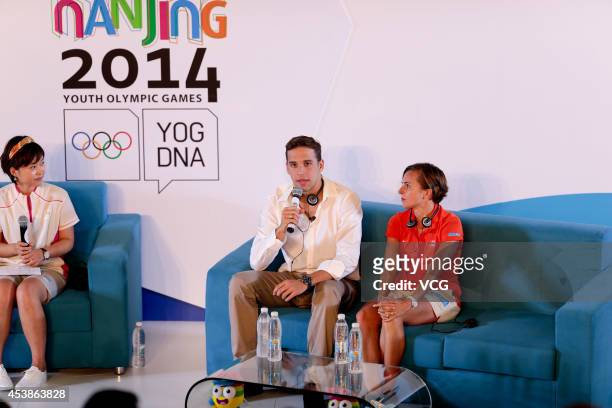 Olympic swimming champion Chad Le Clos and Olympic triathlon champion Emma Snowsill attend "chat with champions" event on day four of the Nanjing...