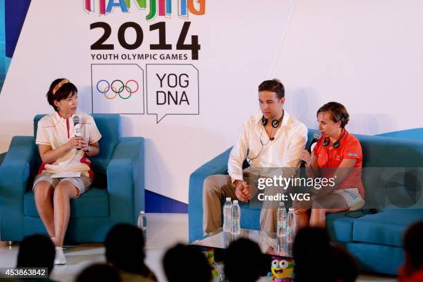 Olympic swimming champion Chad Le Clos and Olympic triathlon champion Emma Snowsill attend "chat with champions" event on day four of the Nanjing...