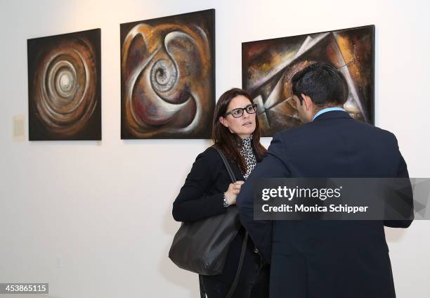 Guests attend "love art, give a smile" Art Fashion And Design Benefit at Clen Gallery on December 5, 2013 in New York City.