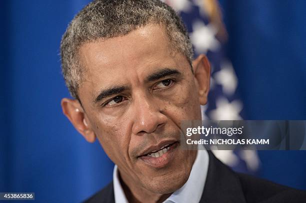 President Barack Obama makes a statement to the press on the death of American journalist James Foley at Martha's Vineyard, Massachusetts August 20,...