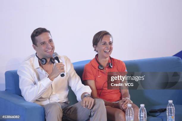 Olympic swimming champion Chad Le Clos and Olympic triathlon champion Emma Snowsill attend 'chat with champions' event on day four of the Nanjing...