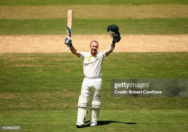 Brad Haddin of Australia celebrates after he scored his century during day two of the Second Ashes Test Match between Australia and England at...
