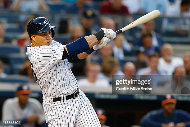 Carlos Beltran of the New York Yankees in action against the Houston Astros at Yankee Stadium on August 19, 2014 in the Bronx borough of New York...